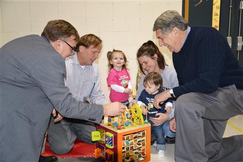 Sen. Hoffman, Sen. Abeler and Sen. Newton play with parents and their children in ECFE classes 